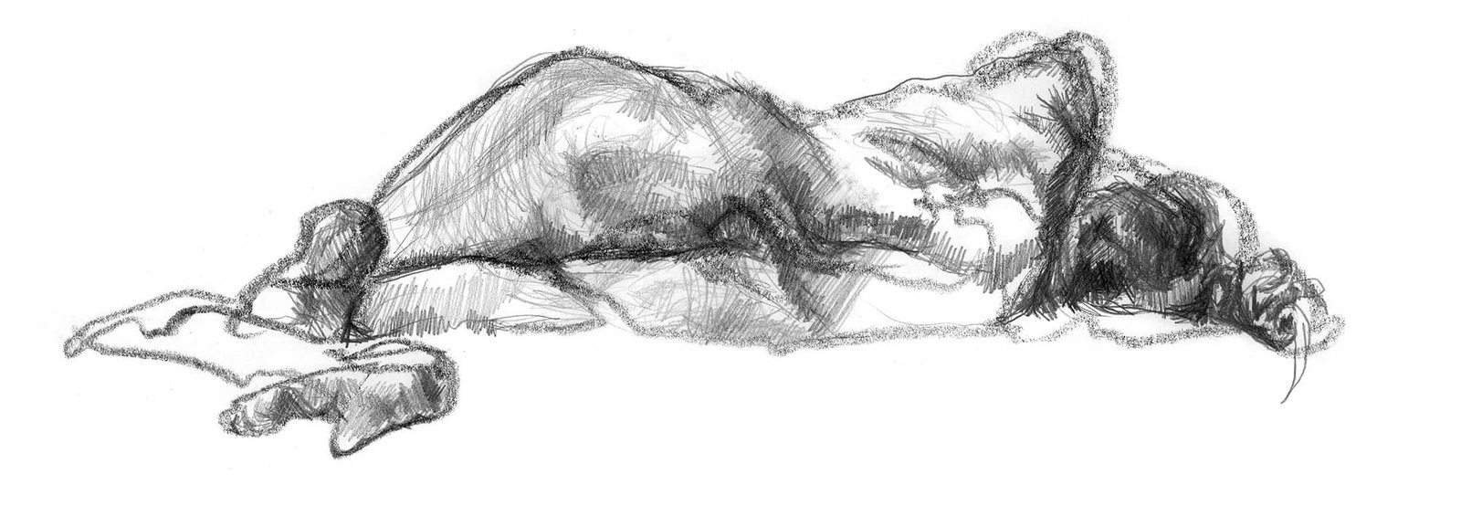 Woman layout across a flat surface showcasing her hips and shoulders