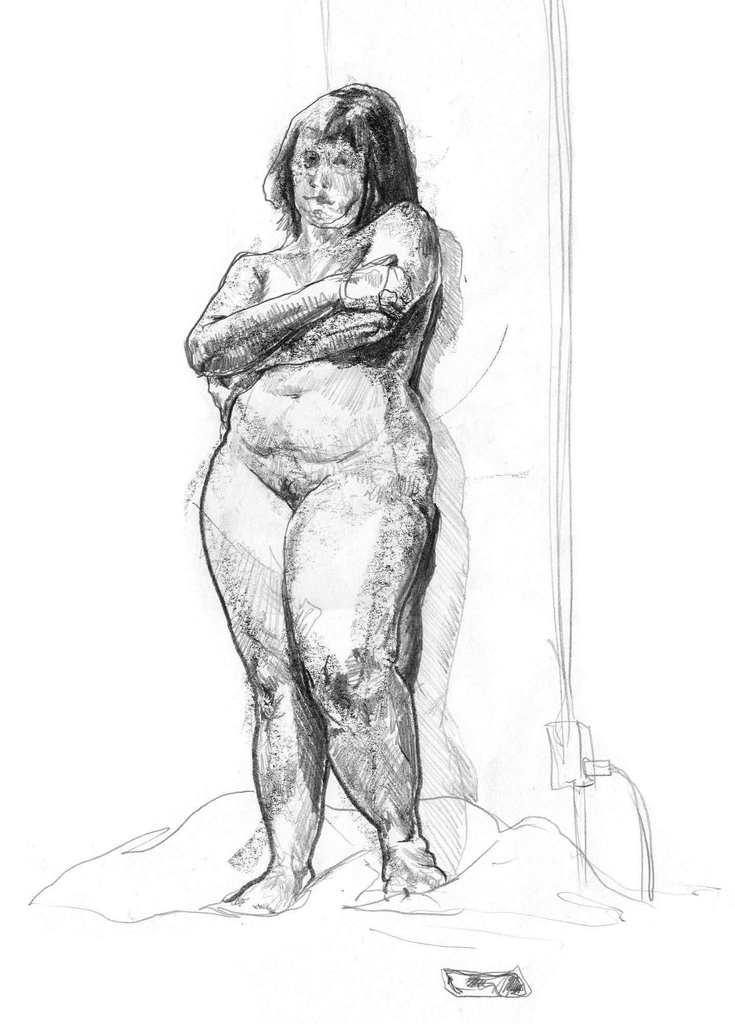 Woman leaning back on a column. Hands crossed and looking down.