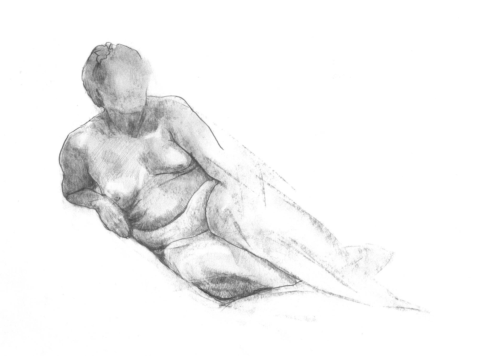 Woman lounging with her elbow under her side supporting her