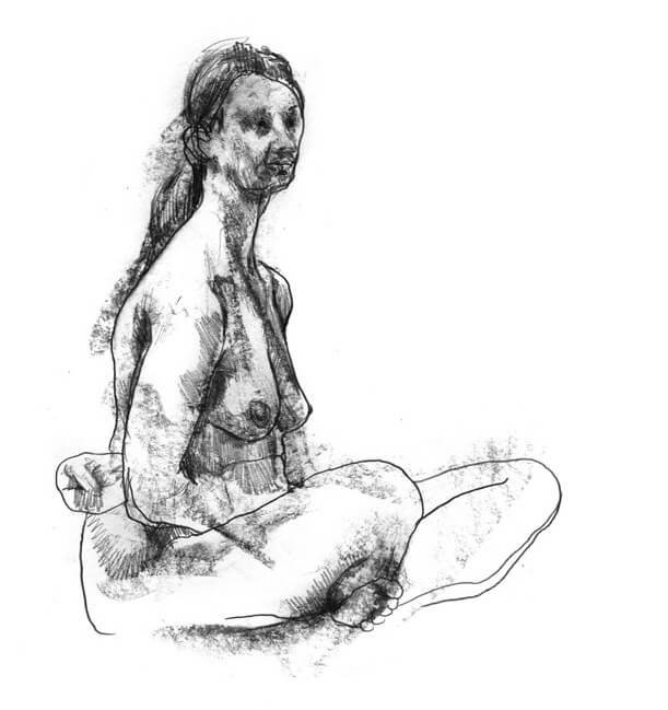 Woman seated cross-legged with arms reaching around her back looking off to the right