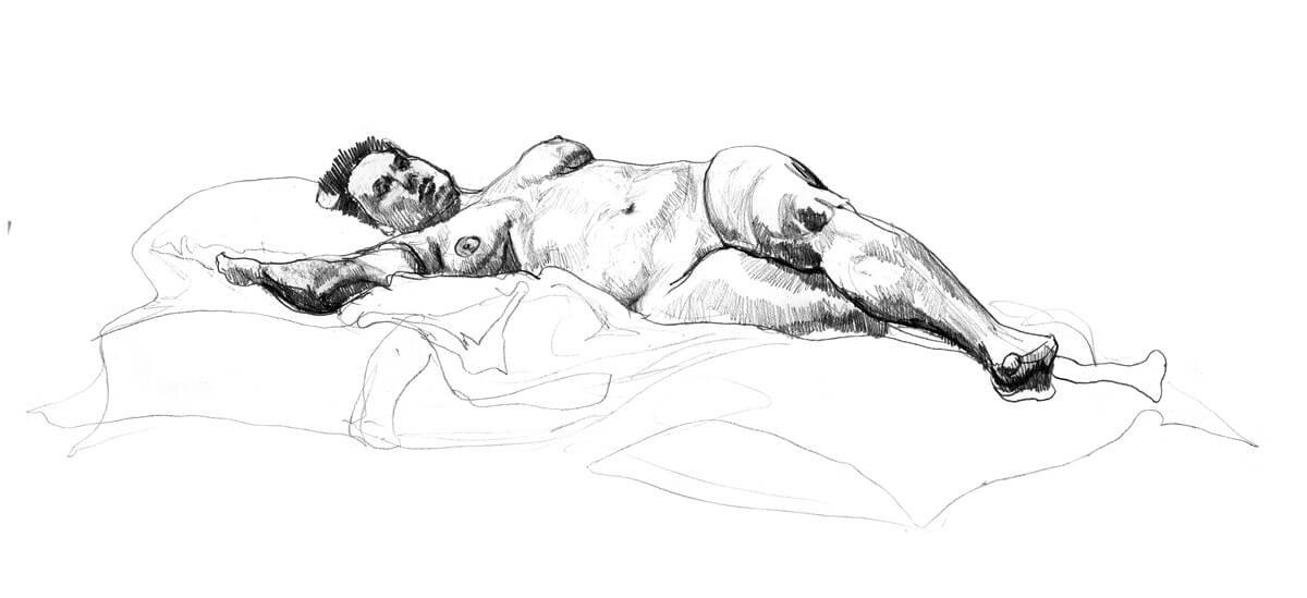 Female model laying out stretched with legs crossed and arms above her head