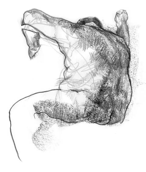 Male model sitting on box with arms stretched up on to pipes